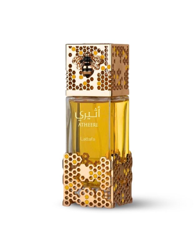 A bottle of Lattafé Atheeri Eau De Parfum Spray with a floral design on the cap and base, containing 100ml of the fragrance.